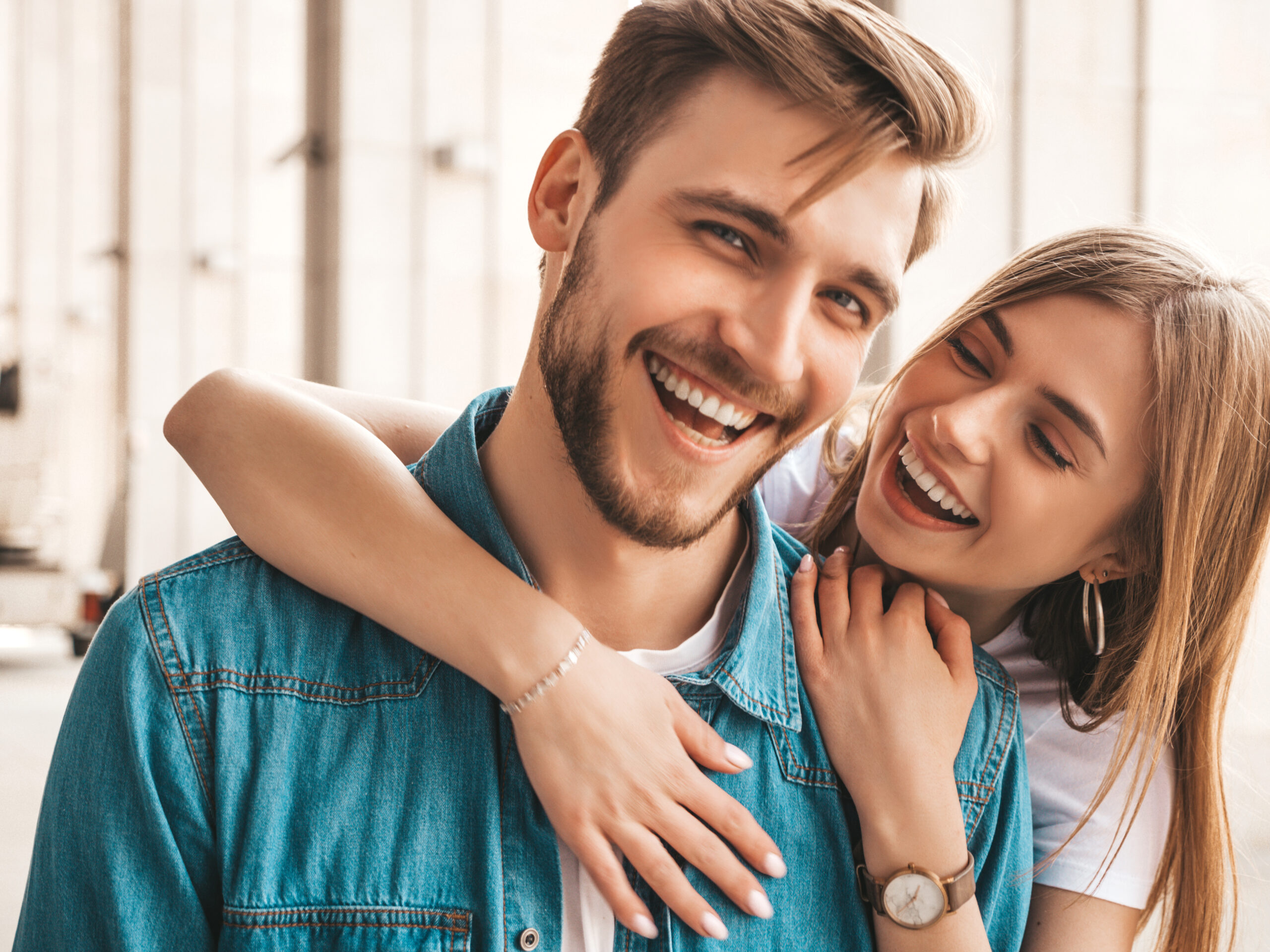 Smiling couple showing bright, natural-looking teeth